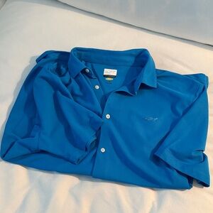 Greg Norman Collection Men’s Short Sleeve Vibrant Blue Button Front Golf Polo